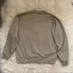beige crewneck sweater